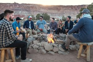 people arround a camp fire