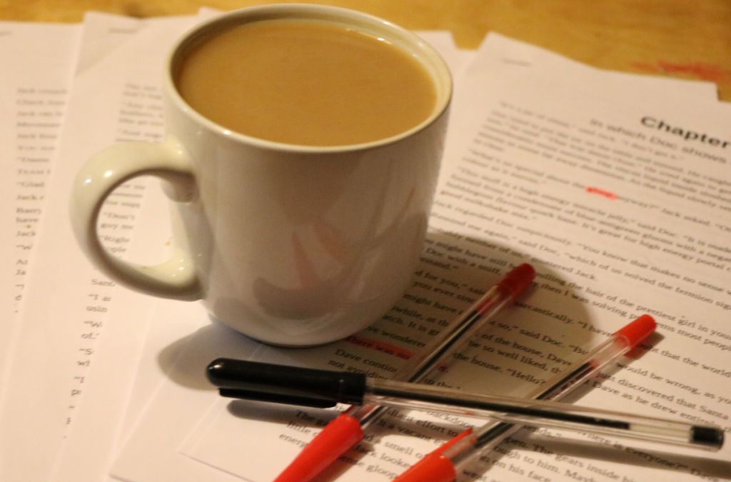 tea cup and pens