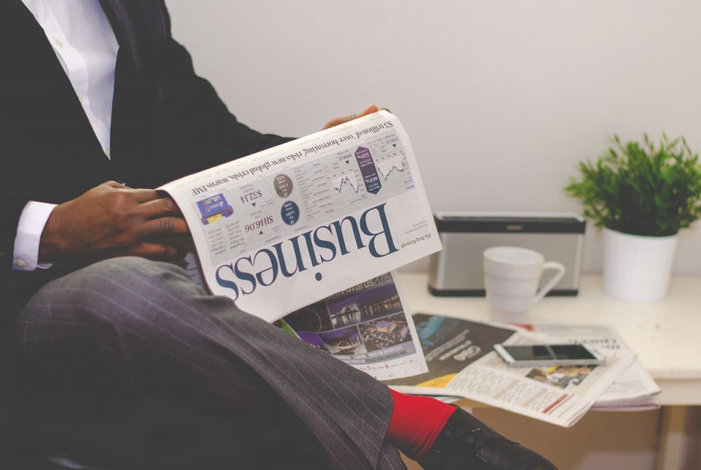business man reading news